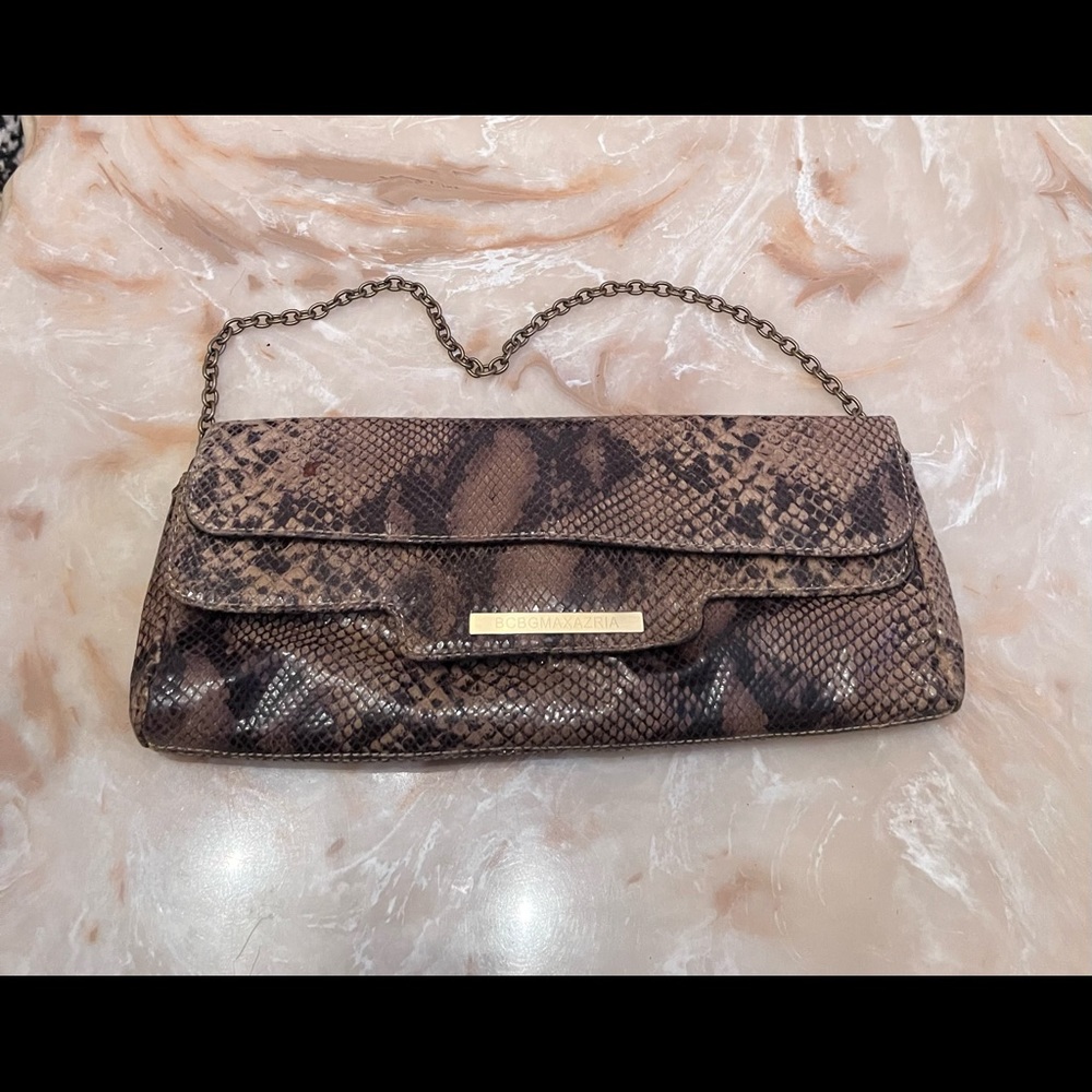 BCBG Maxazria brown snakeskin clutch with gold hardware